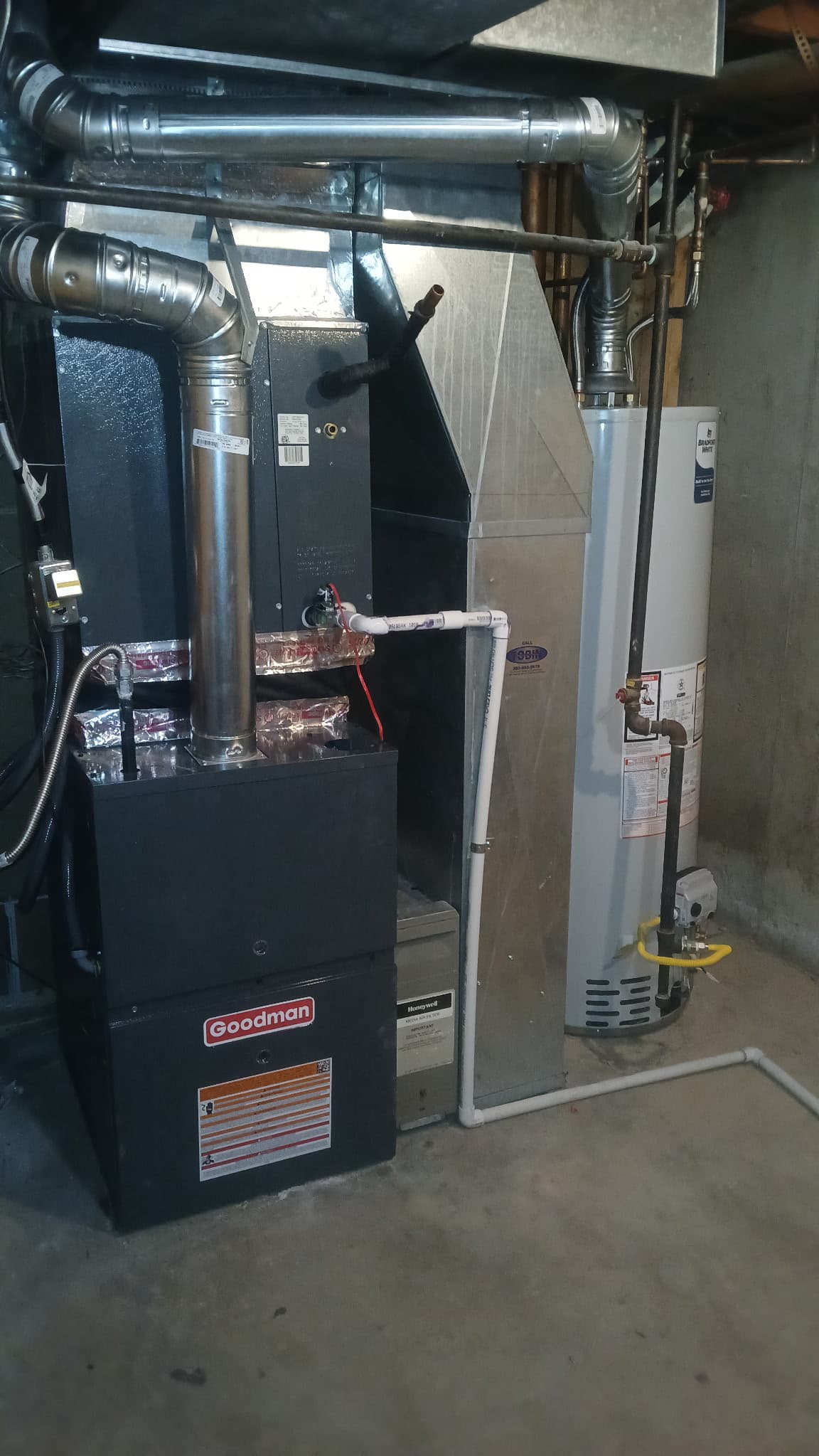 Goodman furnace and water heater installation in Denver basement